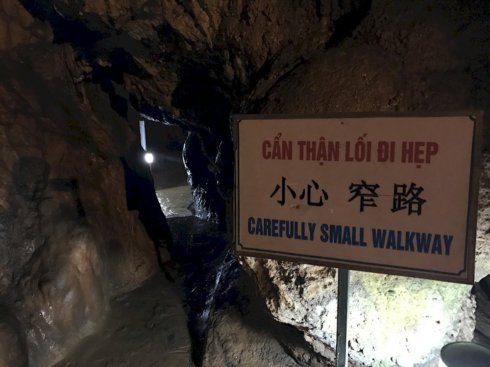 Visitors should be cautious when navigating narrow pathways inside the cave 